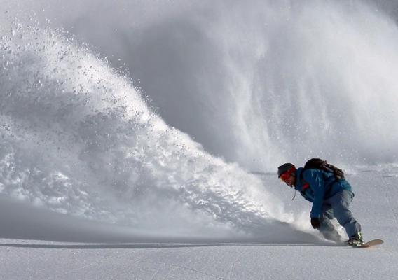 A person snowboarding