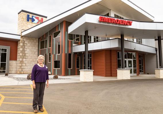 Hot Springs Health CEO Margie Molitor stands in front of the newly expanded and updated hospital in Thermopolis, Wyoming