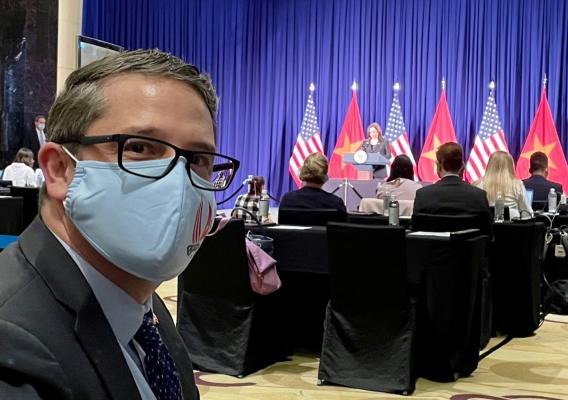 APHIS Foreign Service Officer Joe Vukovich observes VP Kamala Harris as she delivers a speech in Hanoi, Vietnam