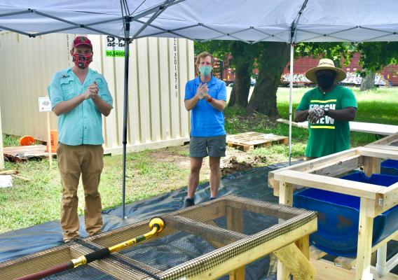 Donn Cooper (L), Project Director at Team Agriculture Georgia gives a workshop on food safety at farm stands and markets