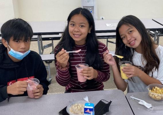 CNMI students enjoying a refreshing fruit smoothie